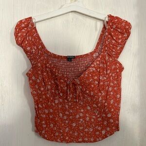 Floral crop corset look alike .